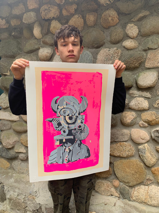 Picture of Henry Earls holding April 2020 print by Elliott Earls